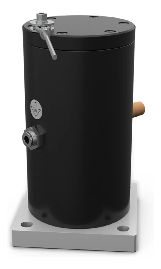 A cushioned piston vibrator in the flange mounted version, seen from the front at an angle: a matt black cylinder with a black cover on top, a brass silencer and a steel air connection on the side, a square aluminium flange with four holes at the bottom, and on top a threaded stud with a thin rod.