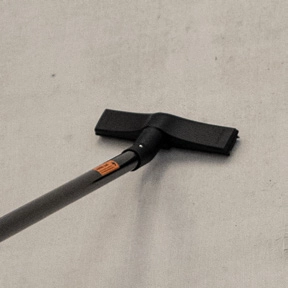 CleanUp flat surface nozzle in use along wall-ceiling junction