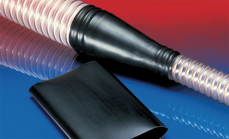 NORRES CONNECT 223 SLEEVE – sort polyolefin krympemuffe monteret på transparent spiralslange.