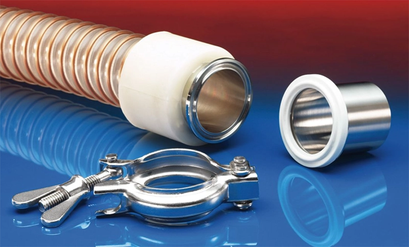 NORRES CONNECT TRI-CLAMP FITTING 245 – rustfri Tri-Clamp adapter (AISI 316L) vist med silikonepakning og klemme.