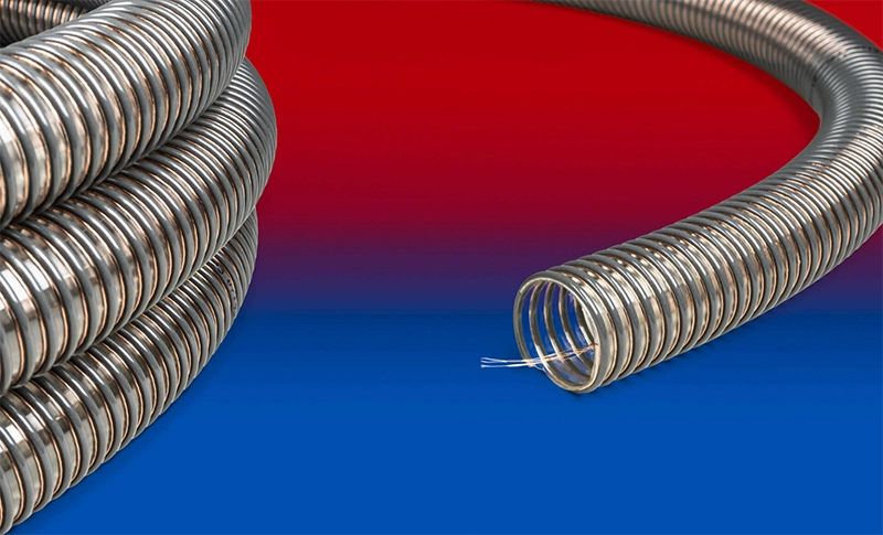 NORRES NORPLAST® PUR 385 AS GRANUFLEX med gennemsigtig væg og antracit spiral, synlig jordledning.