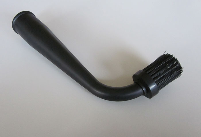 Sort antistatisk DUSTY ATEX/ESD børstemundstykke med buet rør og kompakt nylonbørste, udviklet til præcis rengøring af fint støv i ATEX- og ESD-miljøer